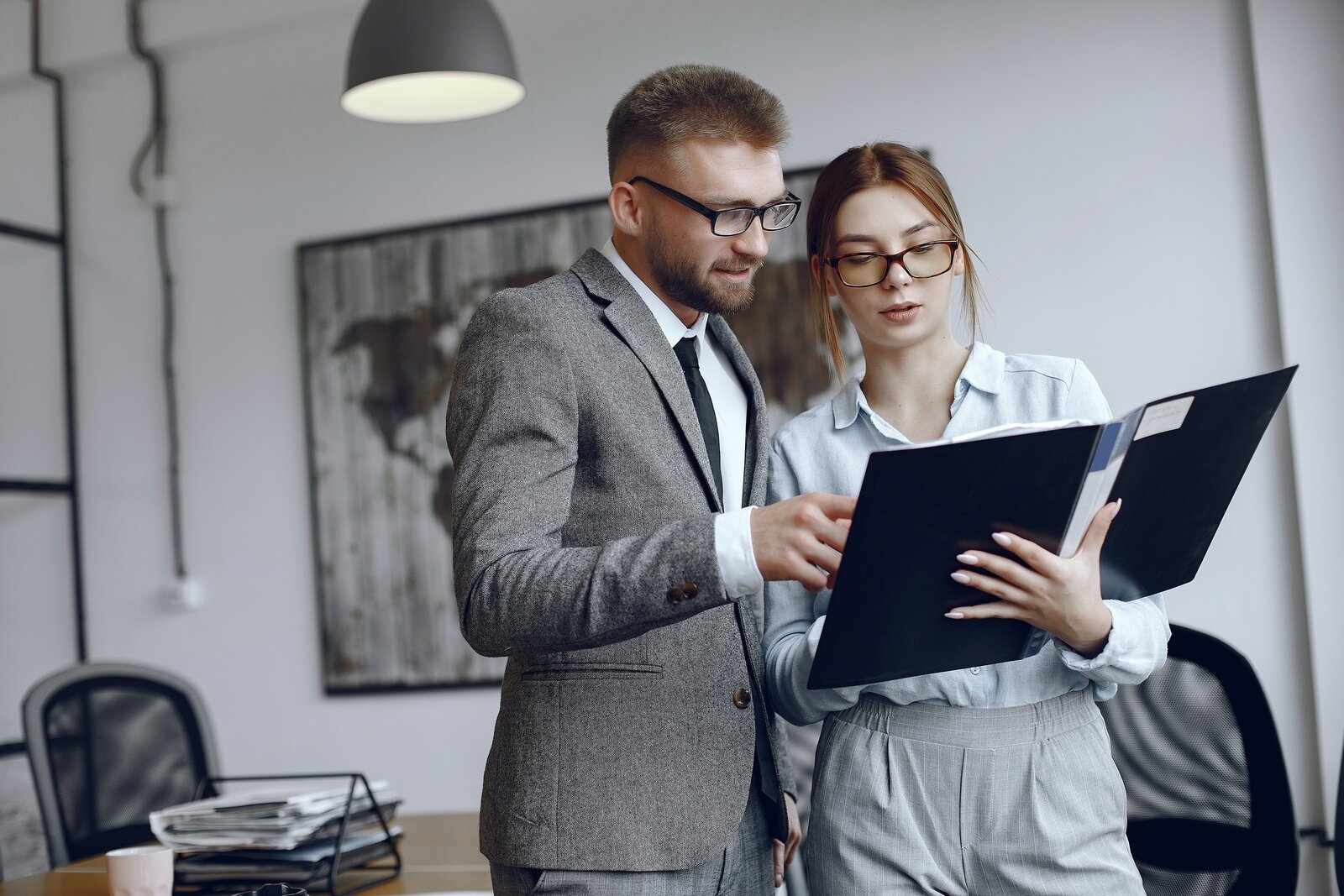 woman-with-glasses-businessman-with-documents-colleagues-work-together.jpg