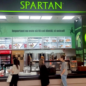 Spartan se extinde în București